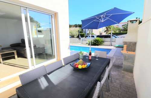 Miami Platja Villa | Relax at Villa Mestral: Rooftop Terrace & Hot Tub Oasis