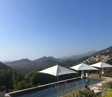Oletta House | Unforgettable Villa Milanu with Oceanfront Pool & Hot Tub