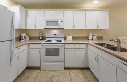 Flint Condo | Relaxing Villa Near Full-Service Marina with Pool & Spa