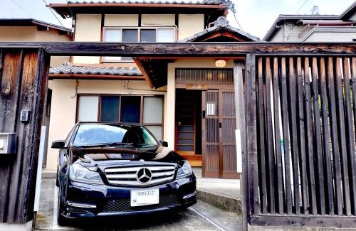 Kita Ward House | Experience Retro Villa Fooga: Pet-Friendly & Hot Tub Bliss