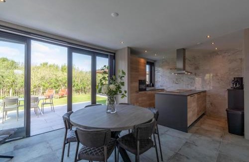Julianadorp aan zee Villa | Relaxing Wellness Villa Lotje with Oceanfront Spa Retreat