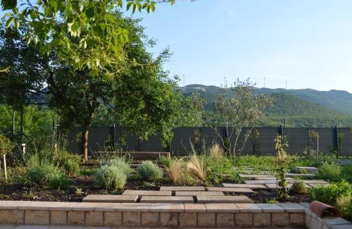Blato na Cetini House | Idyllic Villa by the River with Mountain and Vineyard Views