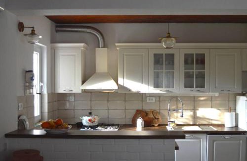 Blato na Cetini House | Idyllic Villa by the River with Mountain and Vineyard Views