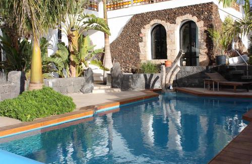 Las Brenas Apartment | Villa Niki: Oceanfront Retreat with Heated Pool & Beach Access
