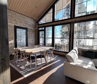 Rovaniemi Villa | Villa Norvahovi - Lake view, sauna and wood interior