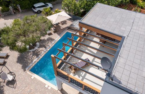 Milcetici Villa | Relax at Villa Novum: Oceanfront Bliss with Pool Access