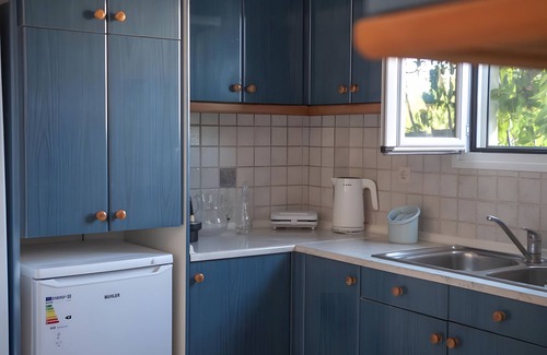 Ag. Georgios Villa | Villa 'Olga' with Shared Pool, Wi-Fi and Air Conditioning