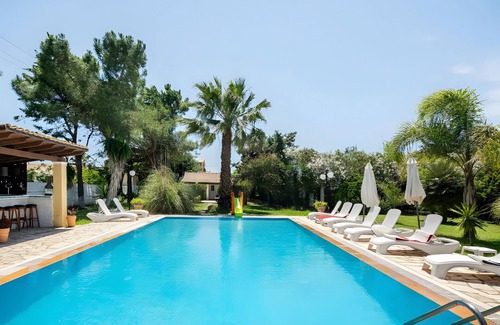 Ag. Georgios Villa | Villa 'Olga' with Shared Pool, Wi-Fi and Air Conditioning