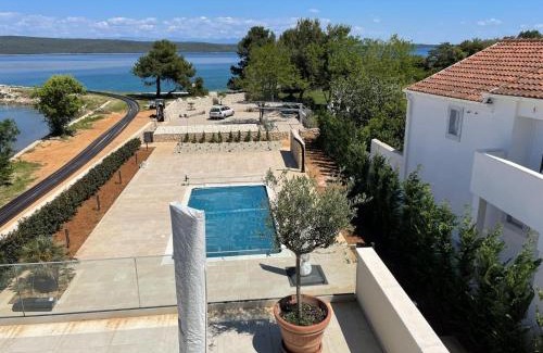 Nerezine Villa | Experience Villa-Onorato: Oceanfront Oasis with Pool