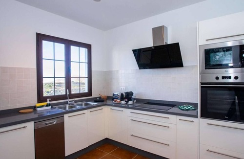 Tinajo House | Villa Palmera: Your Ideal Getaway with Pool & Spa Amenities