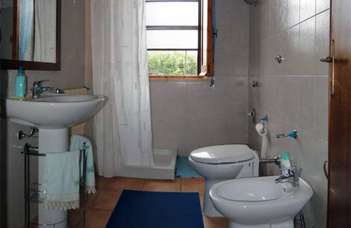Sant'Antioco Villa | Villa Panorama: Scenic Sea Views with Spa & Garden Oasis
