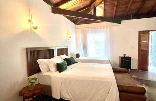 Santa Rita do Ribeira Hotel | Villa Pantai Secret Place: Poolside Bliss Awaits You
