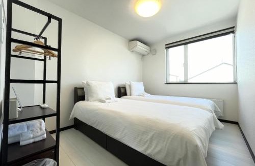 Furano House | Villa Paolo: Family-Friendly Retreat with Hot Tub & Breakfast