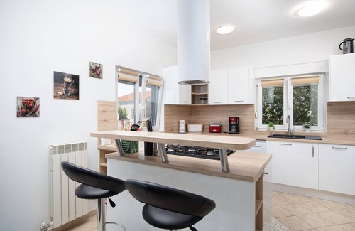 Skatari House | Villa Papillon: Family-Friendly Oasis with Pool & Ocean Views