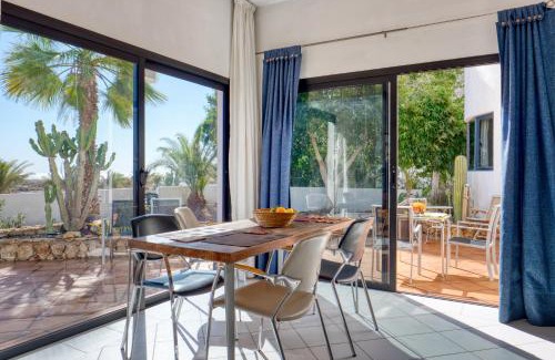 Giniginamar Villa | Discover Villa Paradise Beach: Oceanfront & Pet Friendly Stay