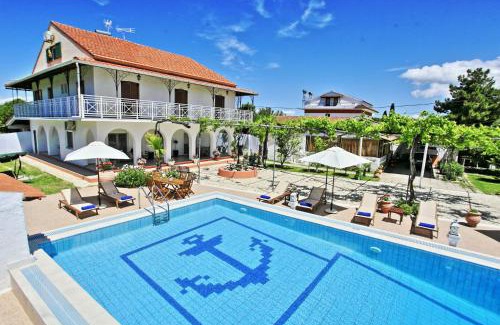 Roda Villa | Villa Paradiso: Beachside Oasis with Pool & Lush Gardens