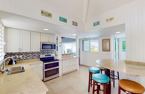 Orient Bay Villa | Elegant Villa Petit Paradis: Pool & Ocean Views Await