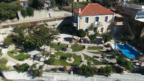 Kalochorafitis Villa | Relax at Villa Petra with Heated Pool and Ocean Views