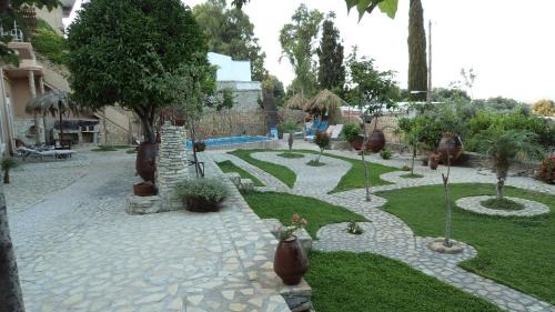 Kalochorafitis Villa | Relax at Villa Petra with Heated Pool and Ocean Views