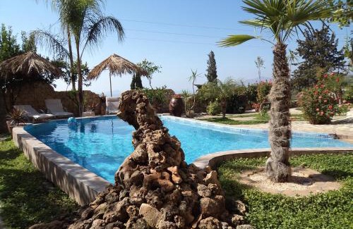 Kalochorafitis Villa | Relax at Villa Petra with Heated Pool and Ocean Views