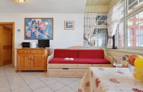 Campitello di Fassa Apartment | Stay at Apt 24 by Interhome: Pet-Friendly Lake View Retreat