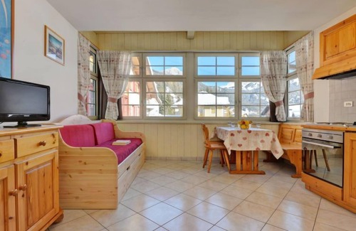 Campitello di Fassa Apartment | Stay at Apt 24 by Interhome: Pet-Friendly Lake View Retreat