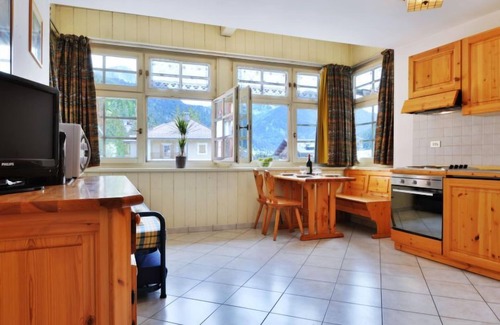 Campitello di Fassa Apartment | Stay at Apt 24 by Interhome: Pet-Friendly Lake View Retreat