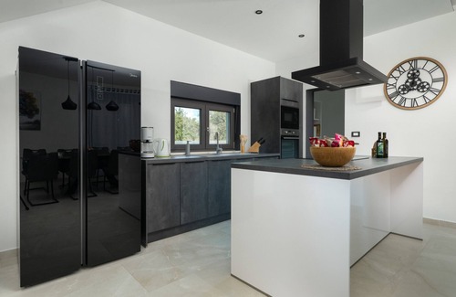 Peruski Villa | Villa Posidonia: Oceanview Retreat Surrounded by Olive Trees