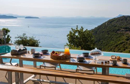 Evgiros Villa | Villa Posidonia: Scenic Views & Saltwater Pool Oasis