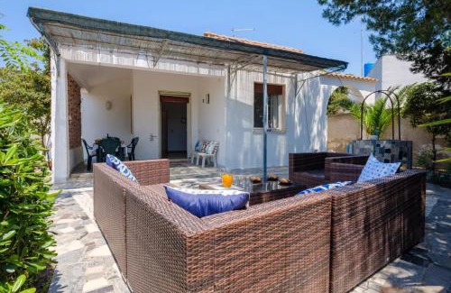 Torre Castiglione Villa | Seaside Comfort at Punta Prosciutto with Wi-Fi & Parking