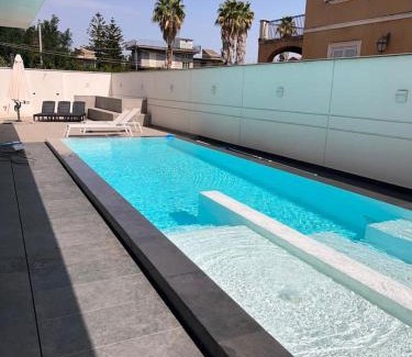 Fondachello Villa | Relax at Villa Queen Vicky: Oceanfront with Pool & Hot Tub
