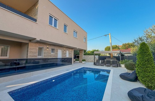 Kastel Stafilic Villa | Villa Rozzaria: Beachside Retreat with Hot Tub & Pool