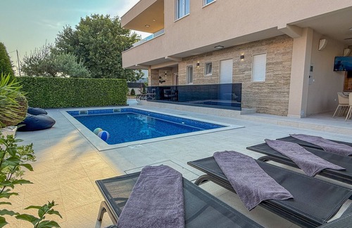 Kastel Stafilic Villa | Villa Rozzaria: Beachside Retreat with Hot Tub & Pool