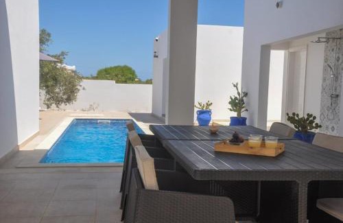 Arkou Villa | Villa Salem: Architect-Designed with Pool & Ocean Views