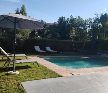 Tassoultante Apartment | Villa Sara: Poolside Relaxation with Oceanfront Views