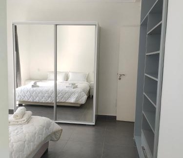 Tassoultante Apartment | Villa Sara: Poolside Relaxation with Oceanfront Views
