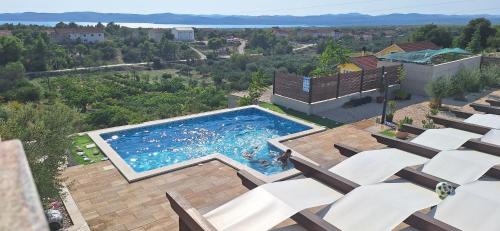 Bicine Apartment | Villa Scolopax rusticola Skradin with Oceanfront Pool