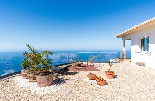 Arco da Calheta Villa | Unforgettable Villa Sea Colors with Oceanfront Pool Access