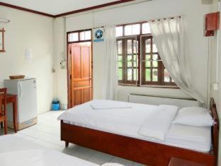 Vientiane House | Oceanfront Villa Sisavad Guesthouse with Pool & Family Fun