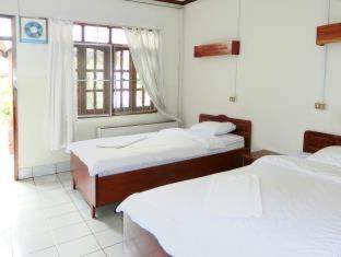 Vientiane House | Oceanfront Villa Sisavad Guesthouse with Pool & Family Fun