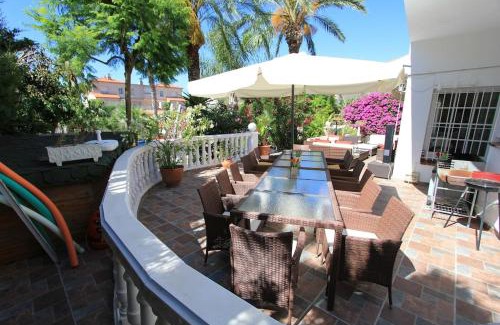 Sitges Villa | Villa Sitges Palm Garden: Steps to Beach with Ocean Views
