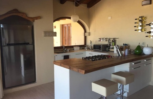 Golfo Aranci Villa | Villa Smeraldo: Guest Rated 10/10 with Family-Friendly Amenities