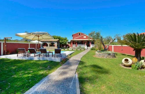 Chalikounas Villa | Villa Sofia: Oceanfront Retreat Steps from the Beach