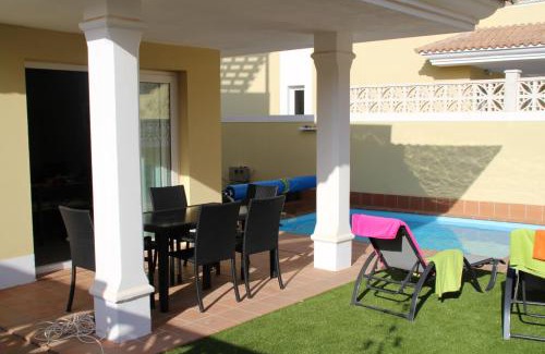 Geafond Villa | Villa Solymar: Oceanfront Escape with Pool & Pet-Friendly Amenities