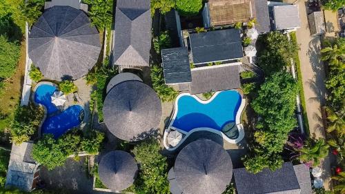 Mlonggo Resort | Villa Suerte: Oceanfront Retreat with Private Beach Access
