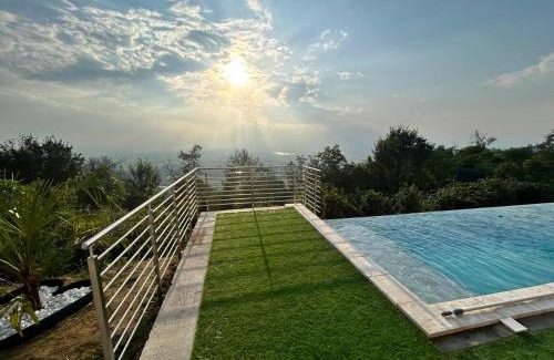 San Raffaele Cimena Apartment | Villa sulle nuvole: Oceanfront 4-Star Retreat with Pool