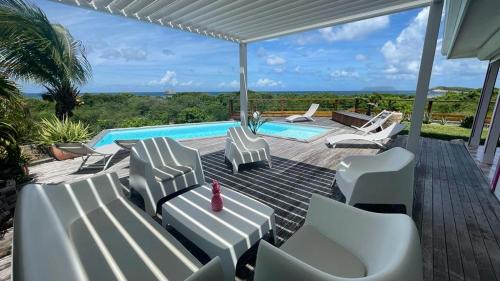 Saint-Francois Villa | Elegant Villa Tarare: Oceanfront Oasis with 9.8 Guest Rating