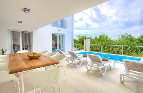 Dobrinj Villa | Villa Terra: Oceanfront Getaway with Pool and Pets Welcome