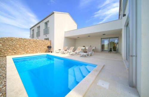 Dobrinj Villa | Villa Terra: Oceanfront Getaway with Pool and Pets Welcome
