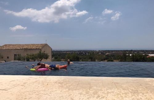 Modica House | Villa Timpazza: Oceanfront Retreat with Pool & Hot Tub